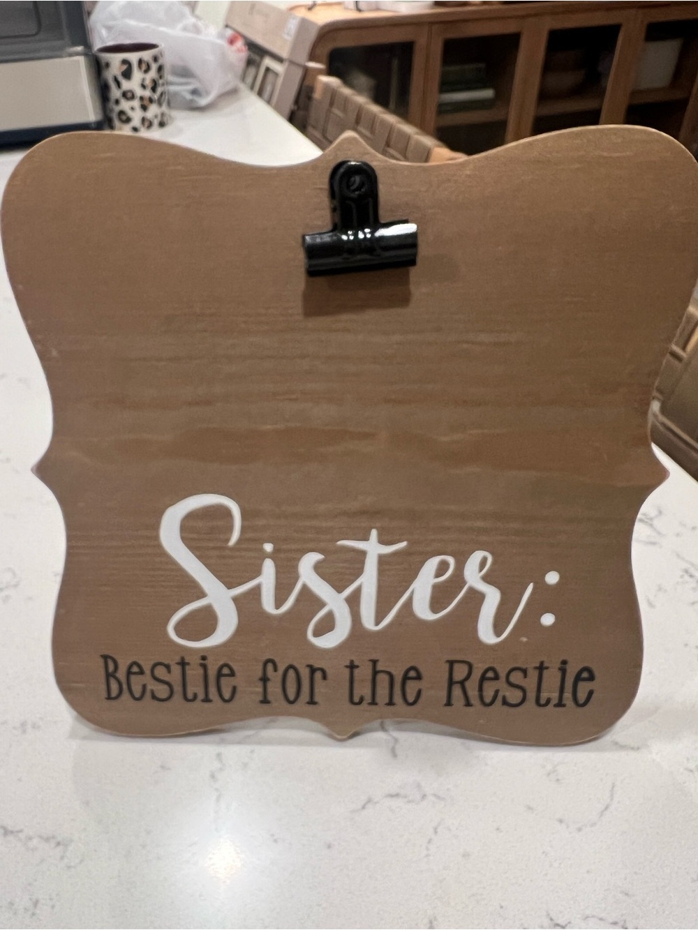Wood picture frame with clip at top